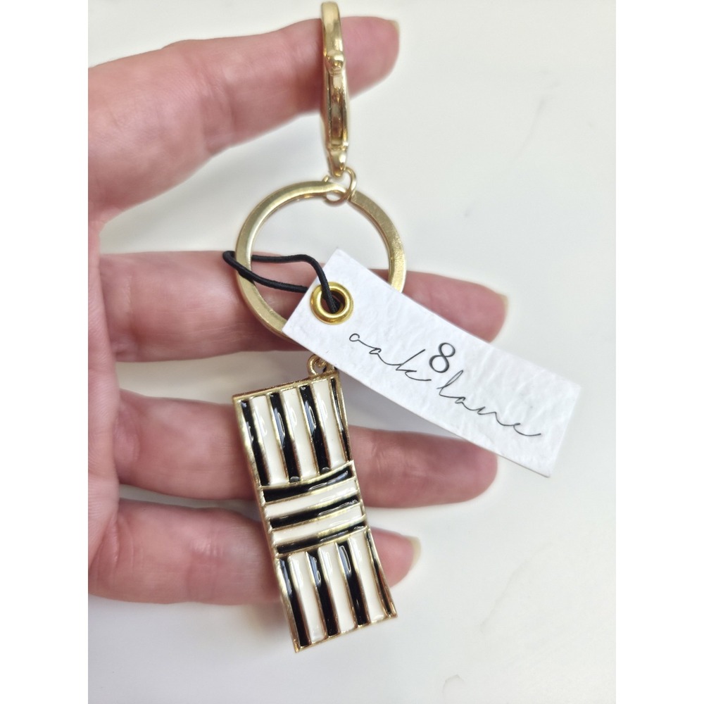 8‎ Oak Lane Bow Keychain Gold Tone Metal Clip Black White Enamal NEW